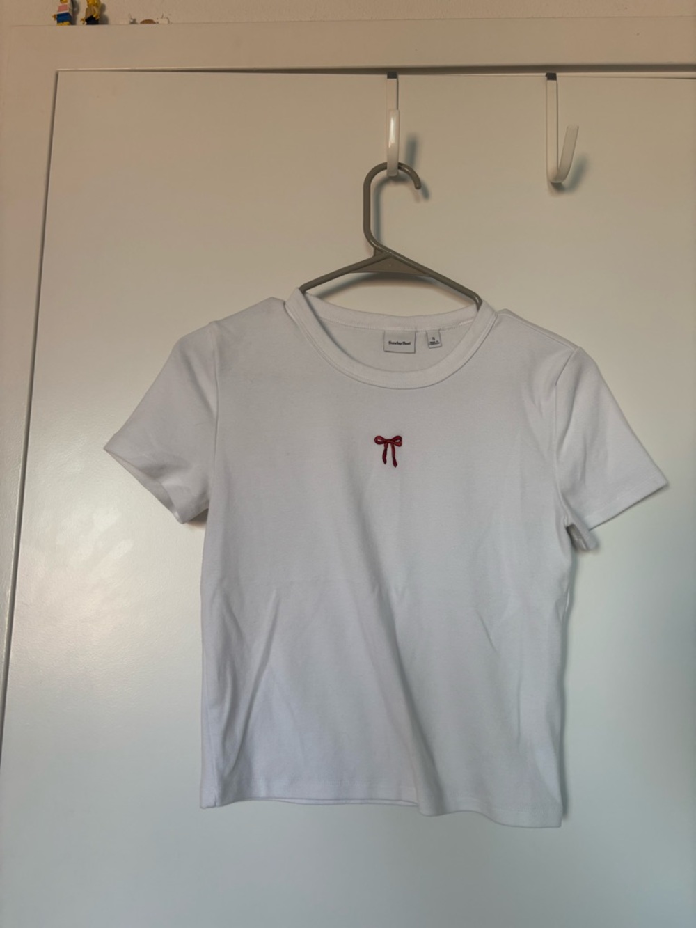 Aritzia White Short Sleeve Tee with Small Red Bow Embroidery